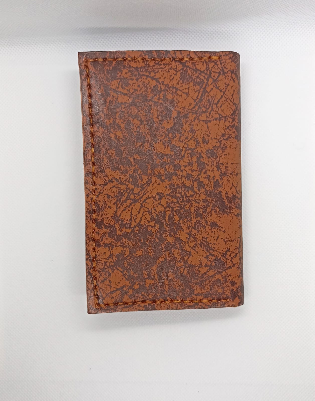 Brown leather wallet on a white background