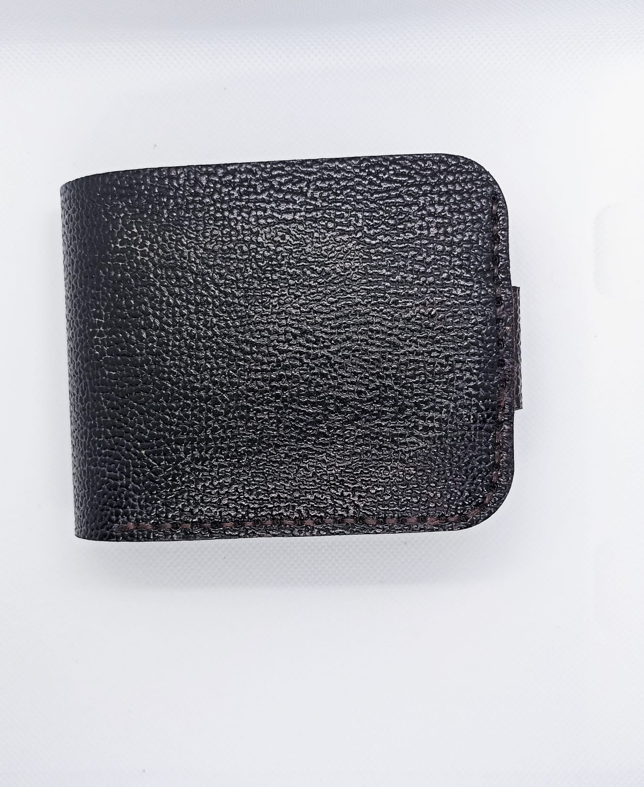 Black leather wallet on a white background
