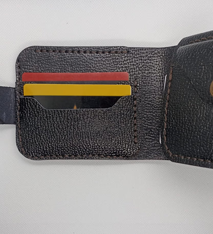 Black textured wallet with card slots on a white background